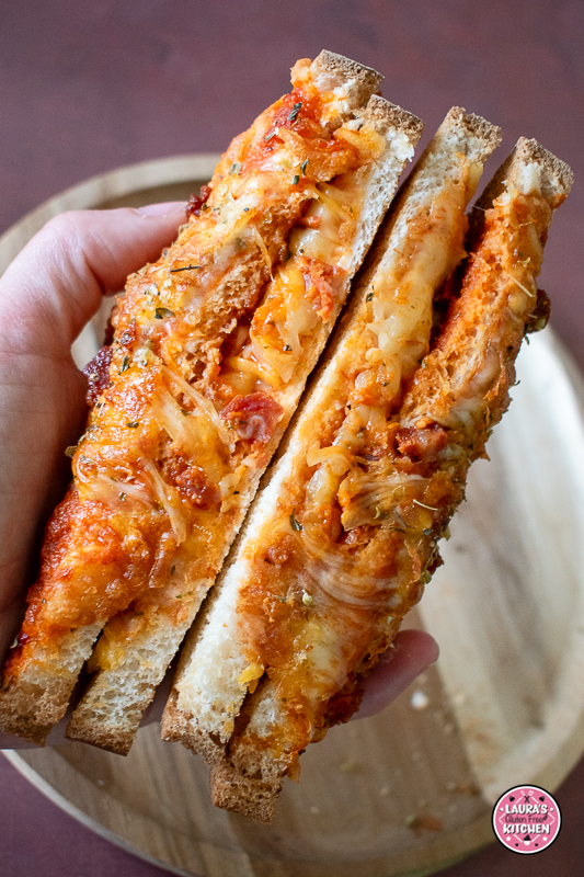 Gluten-free pizza toastie topped with melted cheese and chorizo cooked in the air fryer.