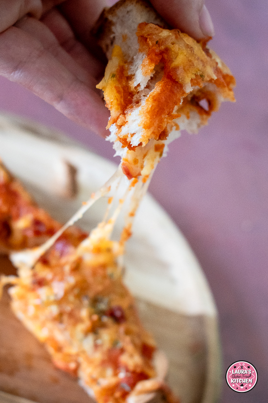 Gluten-free pizza toastie topped with melted cheese and chorizo cooked in the air fryer.